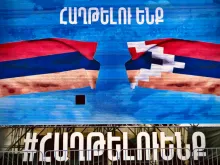 A billboard in Yerevan featuring the flags of Armenia and the breakaway Nagorno-Karabakh Republic on Oct. 7, 2020. 