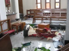 A statue broken by the mob at Sts. Peter and Paul church