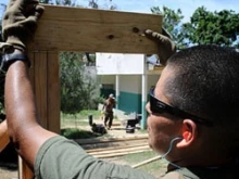 A U.S. soldier assists with rebuilding efforts in Haiti