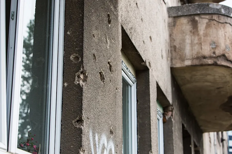 Buildings in Sarajevo still bear the scars of the 1992-1995 Bosnian War. ?w=200&h=150