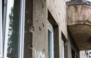 Buildings in Sarajevo still bear the scars of the 1992-1995 Bosnian War.   Andreas Duren/CNA.