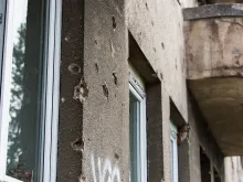 Buildings in Sarajevo still bear the scars of the 1992-1995 Bosnian War. 
