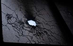 Bullet holes in the window of Divine Mercy church in Managua, Nicaragua.   Marvin Recinos / AFP / Getty.