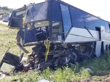 A charter bus crashed on the interstate outside Pueblo, Colo., June 23, 2019. 