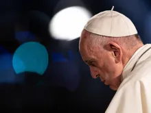 Pope Francis prays during the Good Friday Via Crucis in Rome April 19, 2019. 