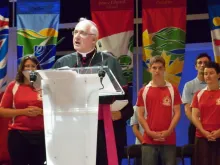 Archbishop Terrence Prendergast, S.J., addresses a rally at World Youth Day in Madrid, Spain, Aug. 16, 2011. 