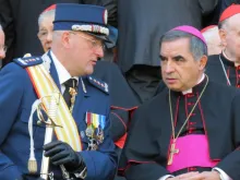 Then-Archbishop Angelo Becciu, as substitute at the Secretariat of State, with Vatican Gendarme Captain Giani Domenico in 2012. 
