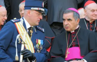 Then-Archbishop Angelo Becciu, as substitute at the Secretariat of State, with Vatican Gendarme Captain Giani Domenico in 2012.   Alan Holdren/CNA