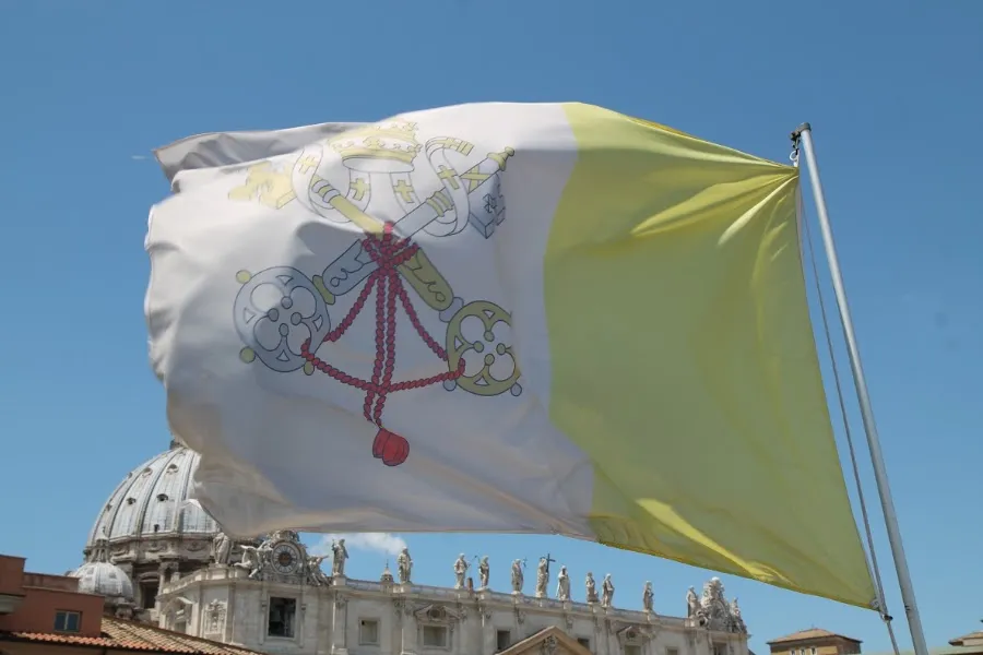 The flag of Vatican City with St. Peter's Basilica in the background on May 29, 2015. ?w=200&h=150