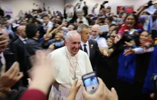 Pope Francis smiles as he walks by a crowd at the World Meeting of Popular Movements in Santa Cruz, Bolivia on July 9, 2015 -
