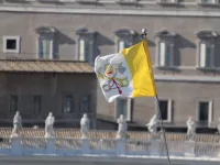 Vatican City flag from the view of the Pontifical Urban University in Rome, Italy on March 12, 2015 - 