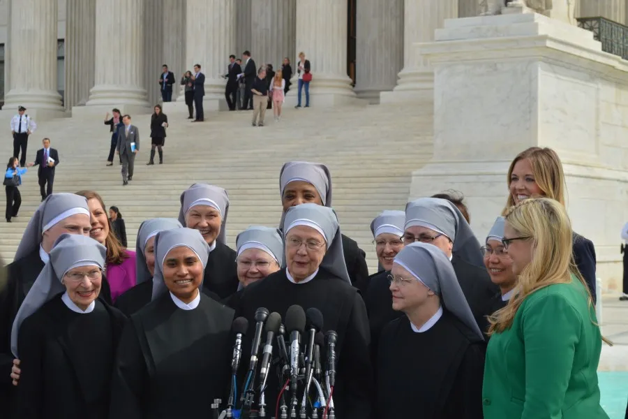 Religious sisters show their support of the Little Sisters of the Poor outside the Supreme Court where oral arguments were heard on March 23, 2016 ?w=200&h=150