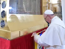 Pope Francis venerates the image of Our Lady of Chiquinquirá at the Cathedral of Bogota in Colombia on September 7, 2017. 