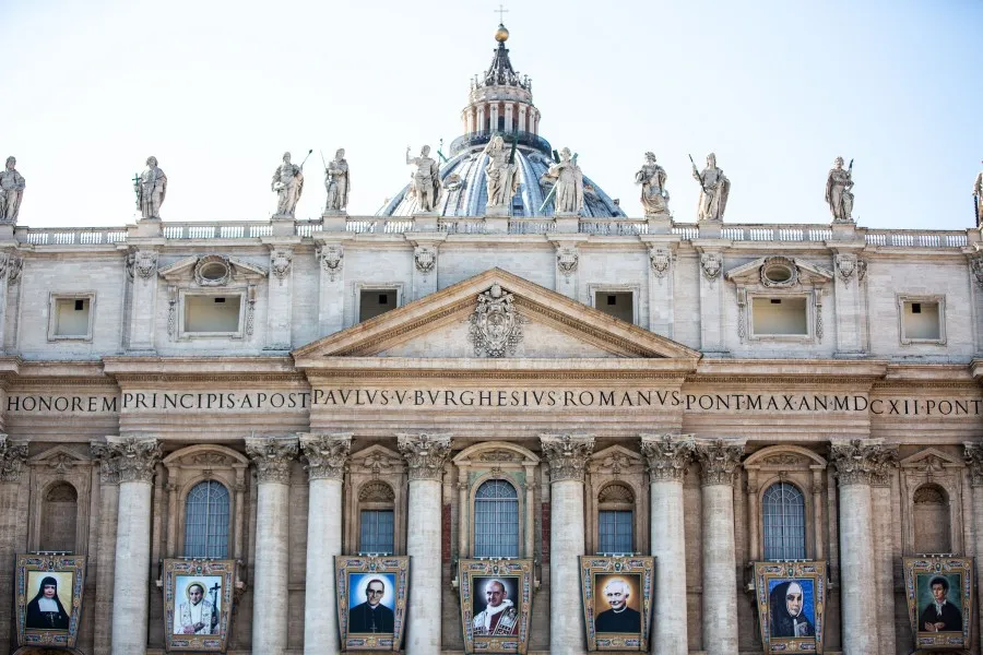 Portraits hang from the facade of St. Peter's Basilica ahead of a Canonization Mass Oct. 12, 2018. ?w=200&h=150