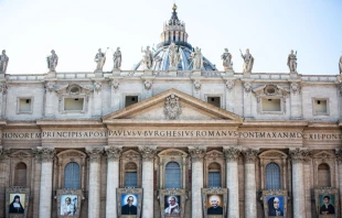 Portraits hang from the facade of St. Peter's Basilica ahead of a Canonization Mass Oct. 12, 2018.   Daniel Ibáñez/CNA.