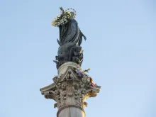 The statue of the Immaculate Conception overlooking the Spanish Steps in Rome. 