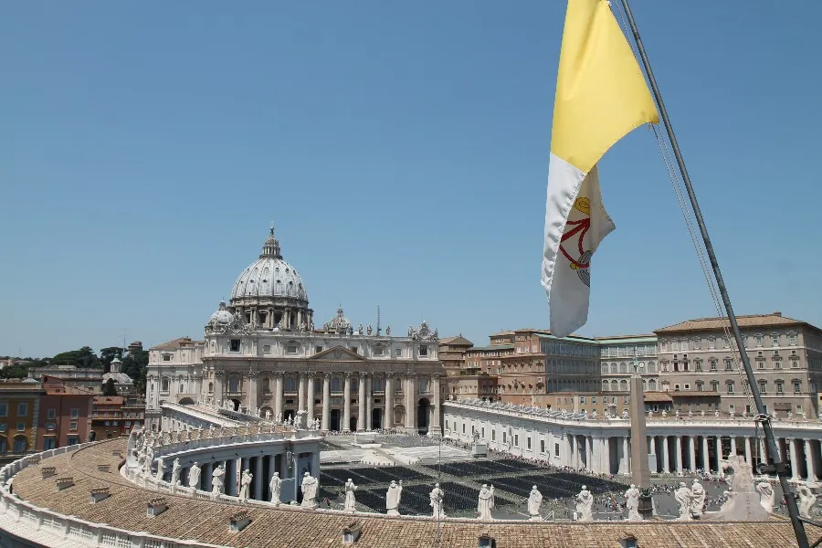 The flag of Vatican City with St. Peter's Basilica in the background. ?w=200&h=150