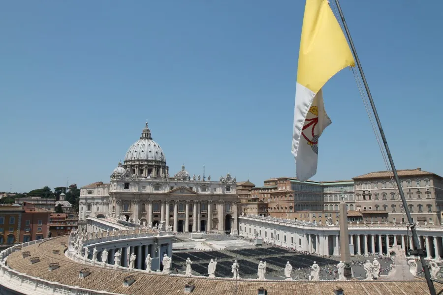 The flag of Vatican City with St. Peter's Basilica in the background on April 29, 2019. ?w=200&h=150