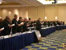 Members of the United States Conference of Catholic Bishops pray together at their Fall Meeting in Baltimore, Maryland on Nov. 11, 2019. 