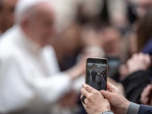 Pope Francis greets pilgrims after the Wednesday general audience in St. Peter's Square on Feb. 26, 2020. 