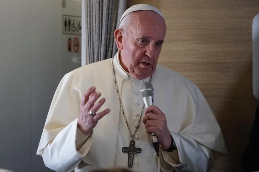 Pope Francis speaks during an in-flight press conference.?w=200&h=150