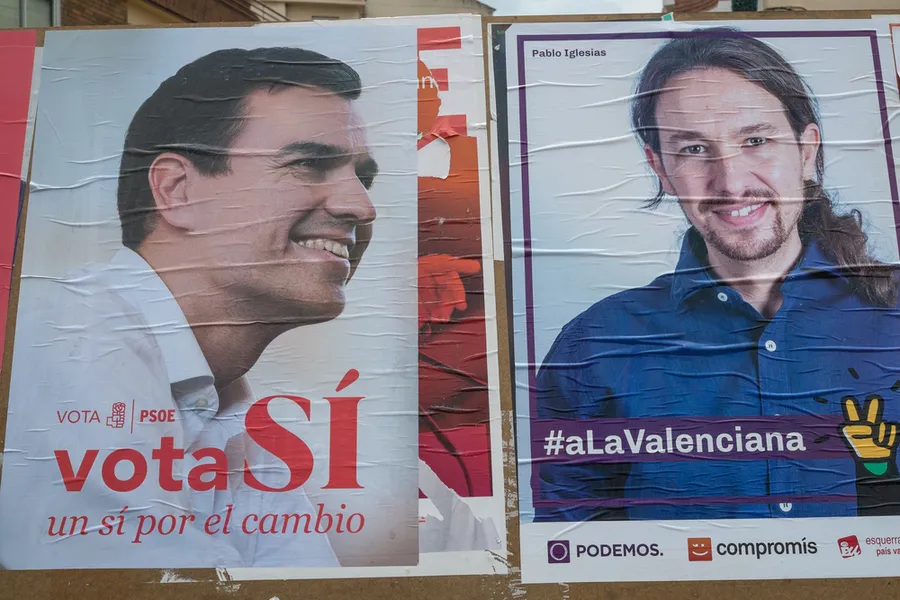 Campaign posters depicting PSOE leader Pedro Sanchez and Podemos leader Pablo Iglesias.?w=200&h=150