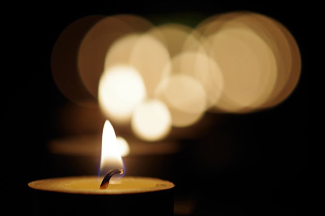 Candle Vigil Credit coloneljohnbritt via Flickr CC BY NC SA 20 CNA 12 12 14