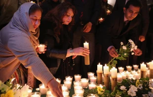 Candlelight prayer vigil in London on Dec. 17, 2014 in memory of the 141 victims, mostly school children, at a school in Peshawar, Pakistan.   Dan Kitwood/Getty Images.