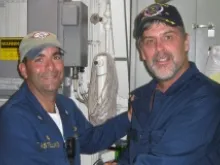 Capt. Richard Phillips (R), with U.S. Navy Cmdr. Frank Castellano. 