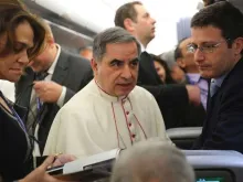 Cardinal Angelo Becciu, center, in 2015. 