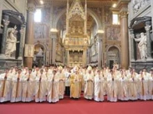 Cardinal DePaolis (center) with the 49 new priests for the Legionaries of Christ in St. John Lateran on Dec. 12. 