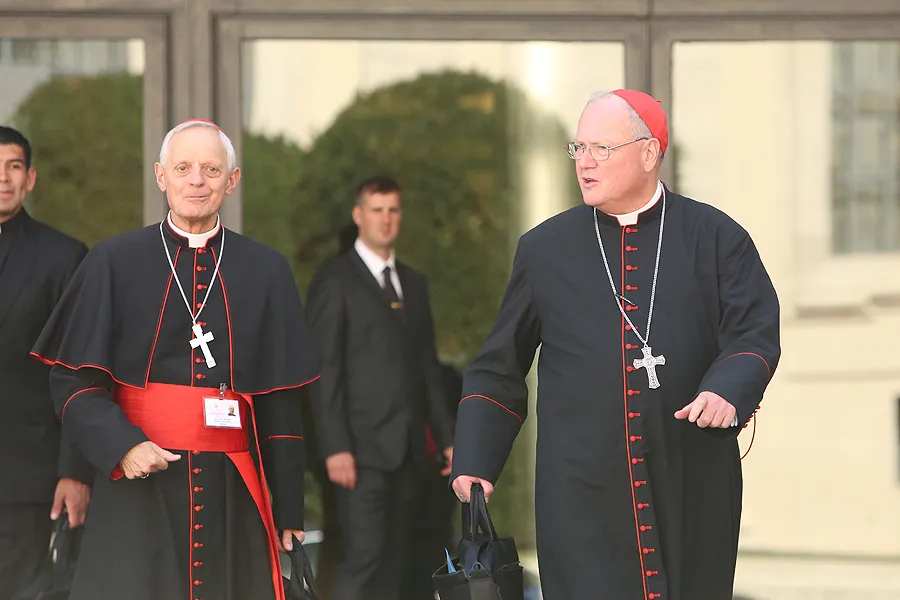 Cardinals Donald Wuerl and Timothy Dolan leave the Vatican's Synod Hall, Oct. 10, 2014. ?w=200&h=150