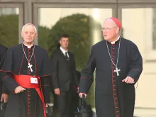 Cardinals Donald Wuerl and Timothy Dolan leave the Vatican's Synod Hall, Oct. 10, 2014. 