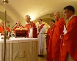 Cardinal Donald W. Wuerl (center) celebrates Mass with Cardinal-designate Edwin O'Brien and Archbishop Timothy Broglio to his left at tomb of St. Peter on Jan. 16, 2012?w=200&h=150
