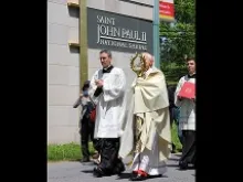 Cardinal Donald Wuerl led a procession to the St. John Paul II National Shrine in Washington D.C., May 11, 2014. 