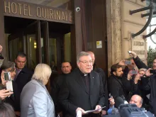 Cardinal George Pell, prefect of the economy secretariat, speaks to reporters outside Rome's Hotel Quirinale after meeting with sex abuse survivors, March 3, 2016. 