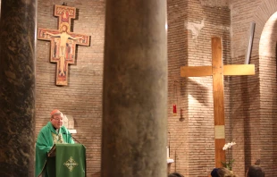 Cardinal George Pell, prefect of the Secretariat for the Economy, says Mass at the St. Lorenzo Youth Centre in Rome, Jan. 30, 2015.   Bohumil Petrik/CNA.