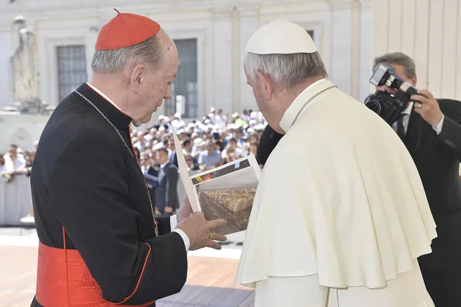 Cardinal Juan Luis Cipriani with Pope Francis showing photos from the March for Life in Lima Peru on June 3 2015 Credit  LOsservatore Romano CNA