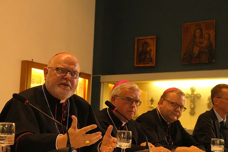 Cardinal Reinhard Marx of Munich and Freising (L) speaks at a press conference held by German bishops at the Teutonic College, Oct. 5, 2015. ?w=200&h=150