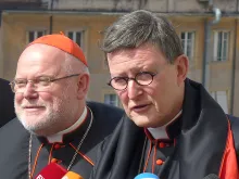 Cardinal Rainer Maria Woelki, then Archbishop of Berlin, (R) and Cardinal Reinhard Marx in Rome, March 14, 2013. 