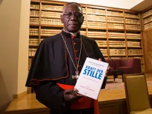 Cardinal Robert Sarah, prefect of the Congregation for Divine Worship, presents one of his books in Rome, May 25, 2017. 