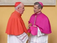 Archbishops Charles J. Brown speaks with Cardinal Sean Brady of Armagh, N. Ireland after his ordination on Jan. 6, 2012