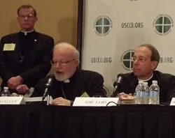 Cardinal Sean O'Malley and Archbishop William Lori speak at a 2012 USCCB conference. ?w=200&h=150