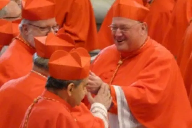 Cardinal Timothy M Dolan is greeted by his brother cardinals Feb 18 2012 CNA Vatican Catholic News 2 18 12