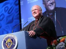 Cardinal Timothy M. Dolan of New York smiles during his keynote address. 