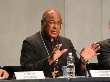 Cardinal Wilfrid Napier speaks at the Vatican Press Office on Oct. 14, 2014. 