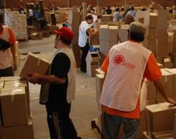 Caritas workers distribute supplies in the Dominican Republic. ?w=200&h=150
