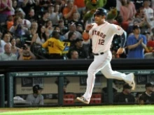 Carlos Peña heads for home plate in a June 2013 game against the Chicago White Sox. Courtesy of the Houston Astros.