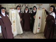 Carmelite Sisters of St. Dominic of Tsachilas with vestments for Pope Francis' visit to Ecuador. 