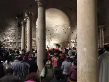 Bishops and other attendees at Mass inside the Catacombs of Domitilla in Rome Oct. 20, 2019. 